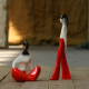 Girl sitting and Girl in flares (red, niddle decoration)